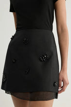 Load image into Gallery viewer, Annelise Mini Skirt in black / Elka Collective