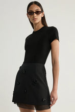Load image into Gallery viewer, Annelise Mini Skirt in black / Elka Collective